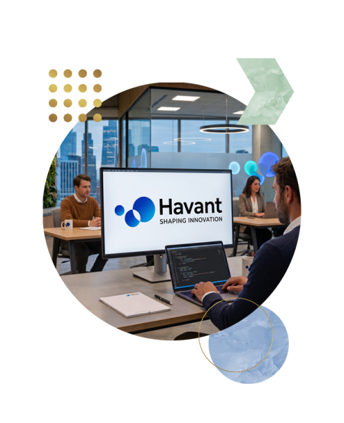 Team of people collaborates in a modern office around a desk, with a monitor showing the Havant logo and 'Shaping Innovation'.